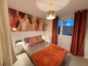 Appartements Cocon Urbain a Saint-Leu-d-Esserent : photos des chambres