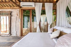 Passionfruit by Toraja Bambu Uluwatu at Padang Padang Beach