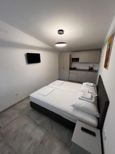 Apartmani Lovren 