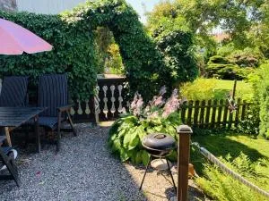 Strandnära suterränglägenhet - Skälsö