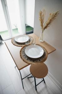 Appartements Verdant Oasis - proche du centre - Wifi gratuit - parking a proximite : photos des chambres