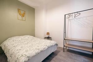 Appartements Verdant Oasis - proche du centre - Wifi gratuit - parking a proximite : photos des chambres