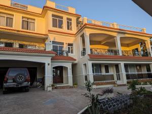 2 BR & 1WR Suite at Villa Costa Verde near Playa Cofresi, Puerto Plata with a pool, balcony, and a rooftop terrace