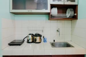 Homey 2BR at Majesty Apartment By Travelio