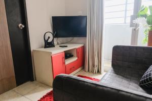 Homey 2BR Apartment at The Edge Bandung By Travelio