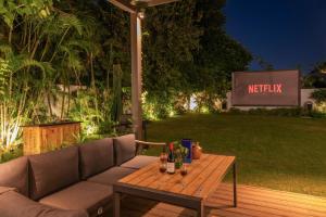 StayVistas The Secret Lagoon with Outdoor Pool, Verdant Lawn & Indoor-Outdoor Activities