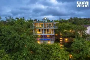 The Glasscape by StayVista - Hillside getaway with Pool and Indoor games - تريمباك