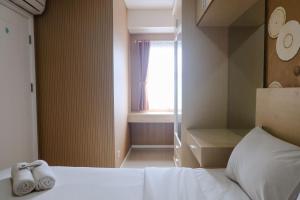 City View 2BR Apartment at Parahyangan Residence By Travelio