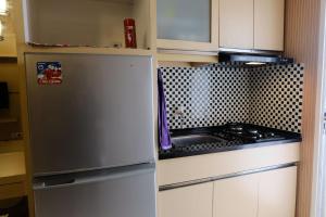 City View 2BR Apartment at Parahyangan Residence By Travelio