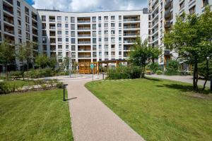 Wola Pleasant Apartment by BookingHost