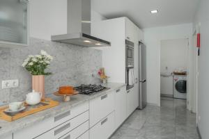 The Plaza Apartment by An Island Apart
