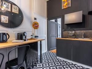 Appartements Le Cadet de Carriere - Charmant studio : photos des chambres