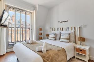 Appartements OIQIA • Intemporel : photos des chambres