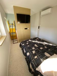 Appartements En face de la Basilique de Saint Nicolas-de-Port : photos des chambres