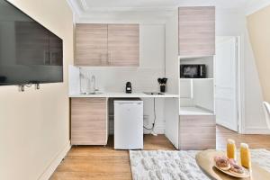 Appartement cosy face de Paris Montparnasse