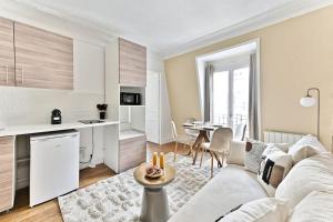 Appartement cosy face de Paris Montparnasse