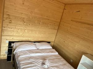 Le Laponya - Chalets climatises avec SPA & Borne de recharge : photos des chambres