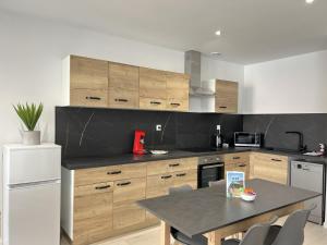 Appartements Le JP : photos des chambres