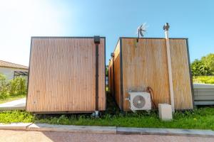 Le Laponya - Chalets climatises avec SPA & Borne de recharge : photos des chambres