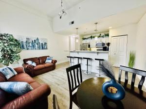 Two Bedroom Game Day Suite with 100 Projector TV