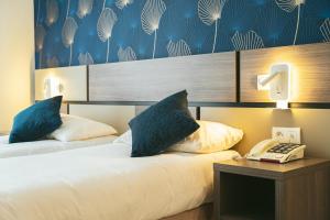 Hotels Holidays & Work HOTEL : Chambre Lits Jumeaux Classique