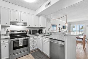 Pelicans Watch Serene Oceanfront Unit 102