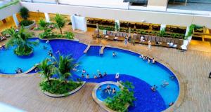 Apto em Resort a 500m do Thermas dos Laranjais