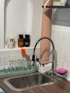 Appartements Splendide Studio tres proche gare - 16min Champs-Elysees : photos des chambres