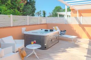 Suite mit Kingsize-Bett mit Whirlpool