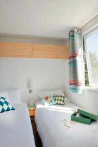 Campings Camping Domaine de la Ville Huchet : photos des chambres