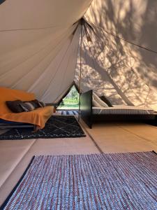 Tentes de luxe Camping la Kahute - Tente lodge au coeur de la foret : photos des chambres