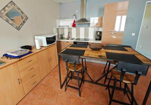 Maisons de vacances Maison de plain-pied avec un grand jardin : photos des chambres
