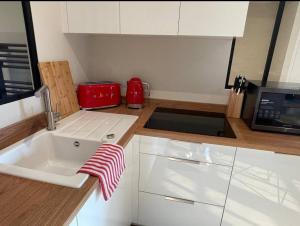 Appartements Appartement Skylar : photos des chambres