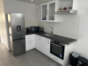 Appartements Appartement - Paris, Disney, Parc des expos, Aeroport CDG, RER B : photos des chambres