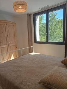 Maisons de vacances Maison individuelle plein centre avec jardin ,au pied du Mont Ventoux : photos des chambres
