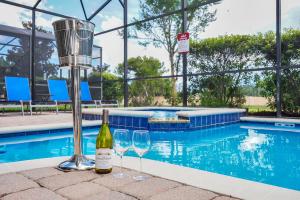 Spacious 6BR Pool Home w Game Room & Harry Potter Mickey Rooms Near Disney