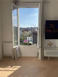 Appartements Superbe appartement lumineux et cosy proche Paris : photos des chambres