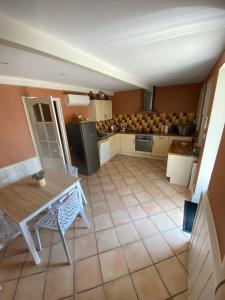 Appartements Maison de village avec terrasse : photos des chambres