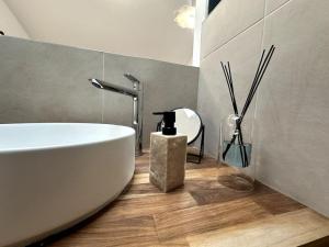 Appartements Gare Unique Duplex lumineux : photos des chambres