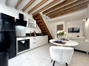 Appartements Gare Unique Duplex lumineux : photos des chambres