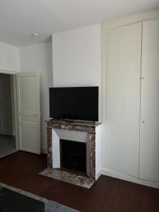 Appartements Appartement style Haussmannien Dreux Centre : photos des chambres