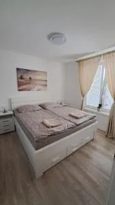 Moderný 2 izbový dom so záhradou a terasou blízko Bratislavy - Limbach