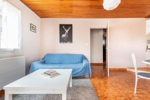 Appartements T3 a St Pons en rez de jardin : photos des chambres