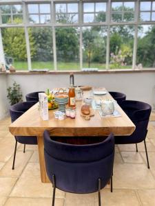 B&B / Chambres d'hotes La Paix, Chalet de charme dans le Bocage Normand : photos des chambres