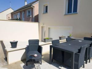 Maisons de vacances Maison pour 4 a 8 personnes a 15 min de Disney : photos des chambres