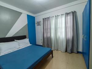 Host Homes - Gomez St 1 or 2BR Apartelle