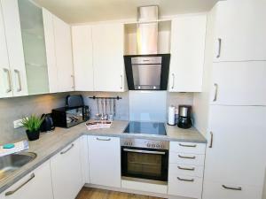 Ulmer Penthouse für 7, Arbeitsplatz, XXL-Dachterrasse, Grill, Wii
