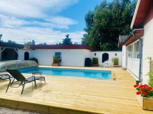 Hus med uppvärmd pool