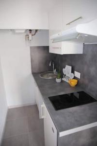 Appartements A deux pas de la plage - Les lauriers roses : photos des chambres