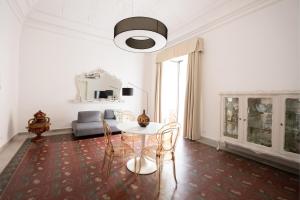 B. Sicilian Charming Stay Historical Suite